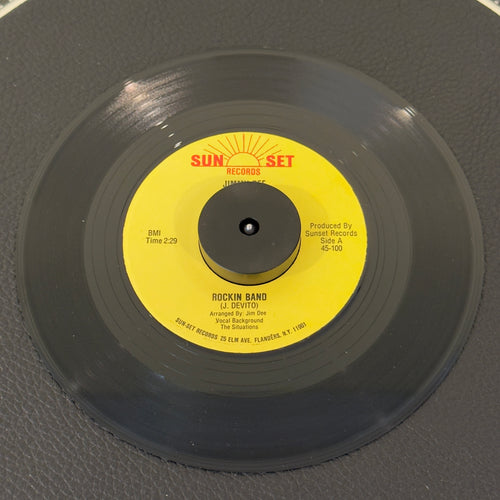 7" vinyl record by Dee, Jimmy featuring "Rockin Band/My Way", released on Sunset Records (45-100), in VG+ (Very Good Plus) condition, classic analog collectable for turntable playback. Rare 1980s rockabilly 45!  Slight mark on B Side of label.