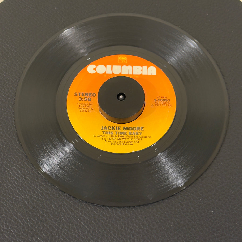 7" vinyl record by Moore, Jackie featuring "This TIme Baby/Let's Go Somewhere And Make Love", released on Columbia (3-10993), in VG+ (Very Good Plus) condition, classic analog collectable for turntable playback. Includes original Columbia sleeve.