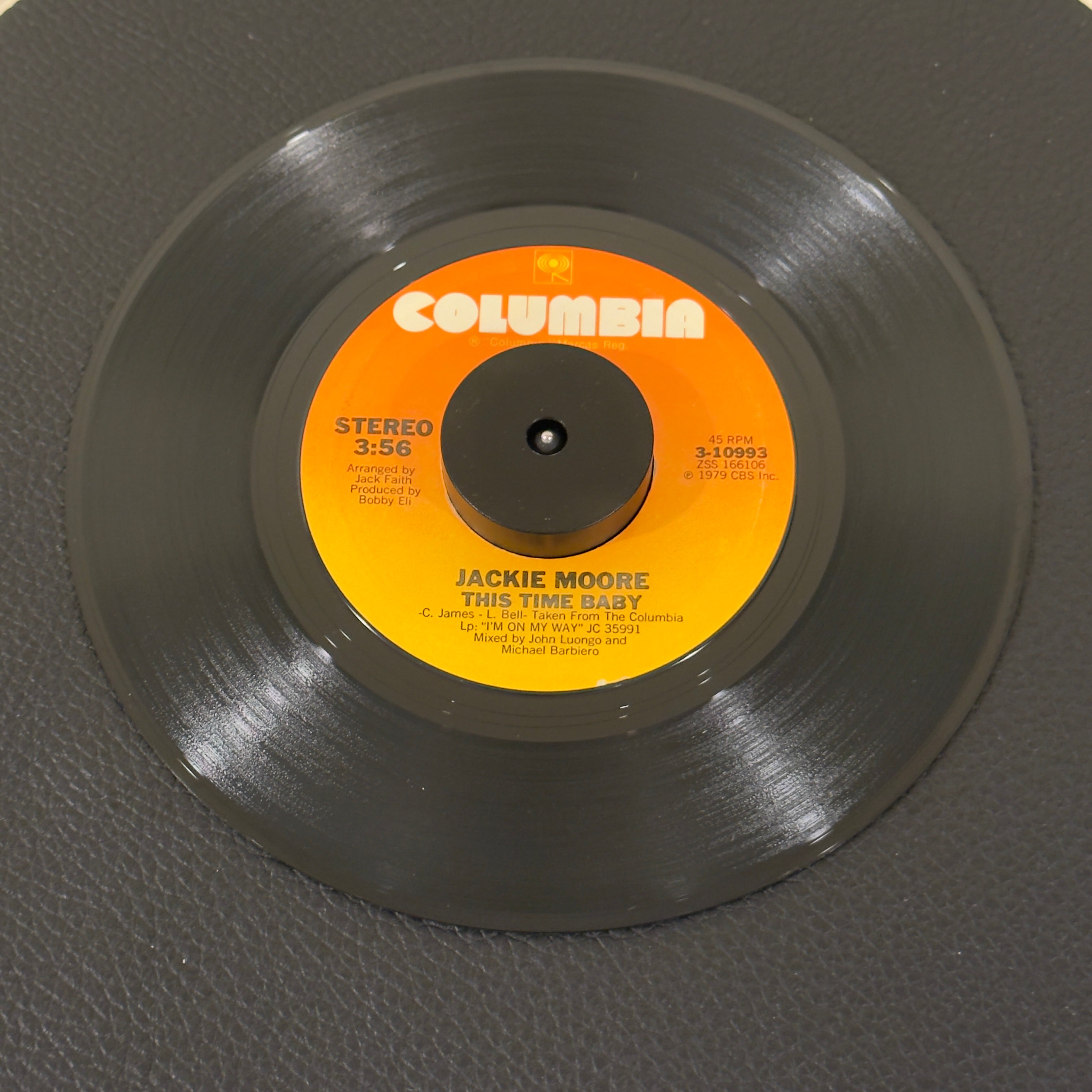 7" vinyl record by Moore, Jackie featuring "This TIme Baby/Let's Go Somewhere And Make Love", released on Columbia (3-10993), in VG+ (Very Good Plus) condition, classic analog collectable for turntable playback. Includes original Columbia sleeve.