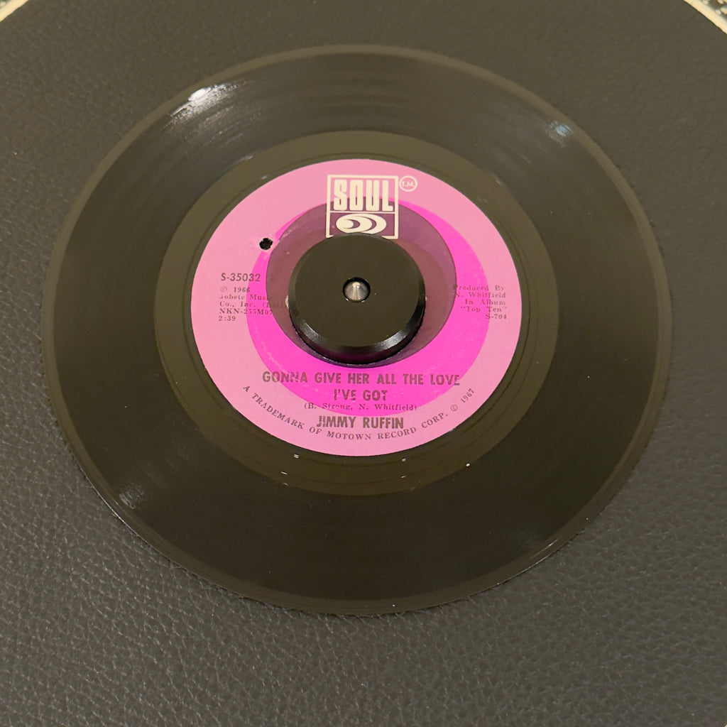 7" vinyl record by Ruffin, Jimmy featuring "Gonna Give Her All The Love I've Got/World So Wide, Nowhere To Hide (From Your Heart)", released on Soul (S-35032), in VG+ (Very Good Plus) condition, classic analog collectable for turntable playback. Masterclass in heartbroken, mid-tempo Motown soul.  Label has a BB hole.