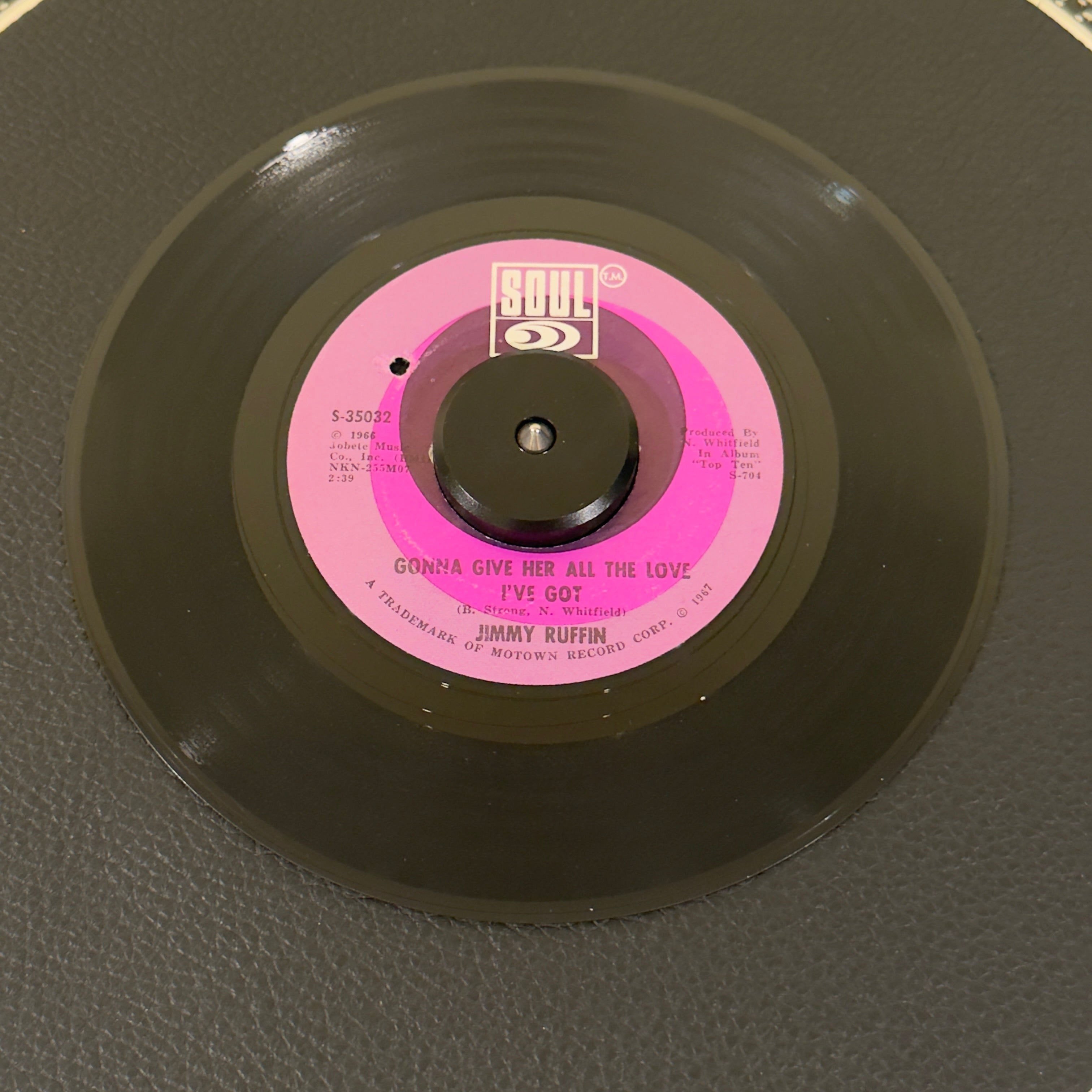7" vinyl record by Ruffin, Jimmy featuring "Gonna Give Her All The Love I've Got/World So Wide, Nowhere To Hide (From Your Heart)", released on Soul (S-35032), in VG+ (Very Good Plus) condition, classic analog collectable for turntable playback. Masterclass in heartbroken, mid-tempo Motown soul.  Label has a BB hole.