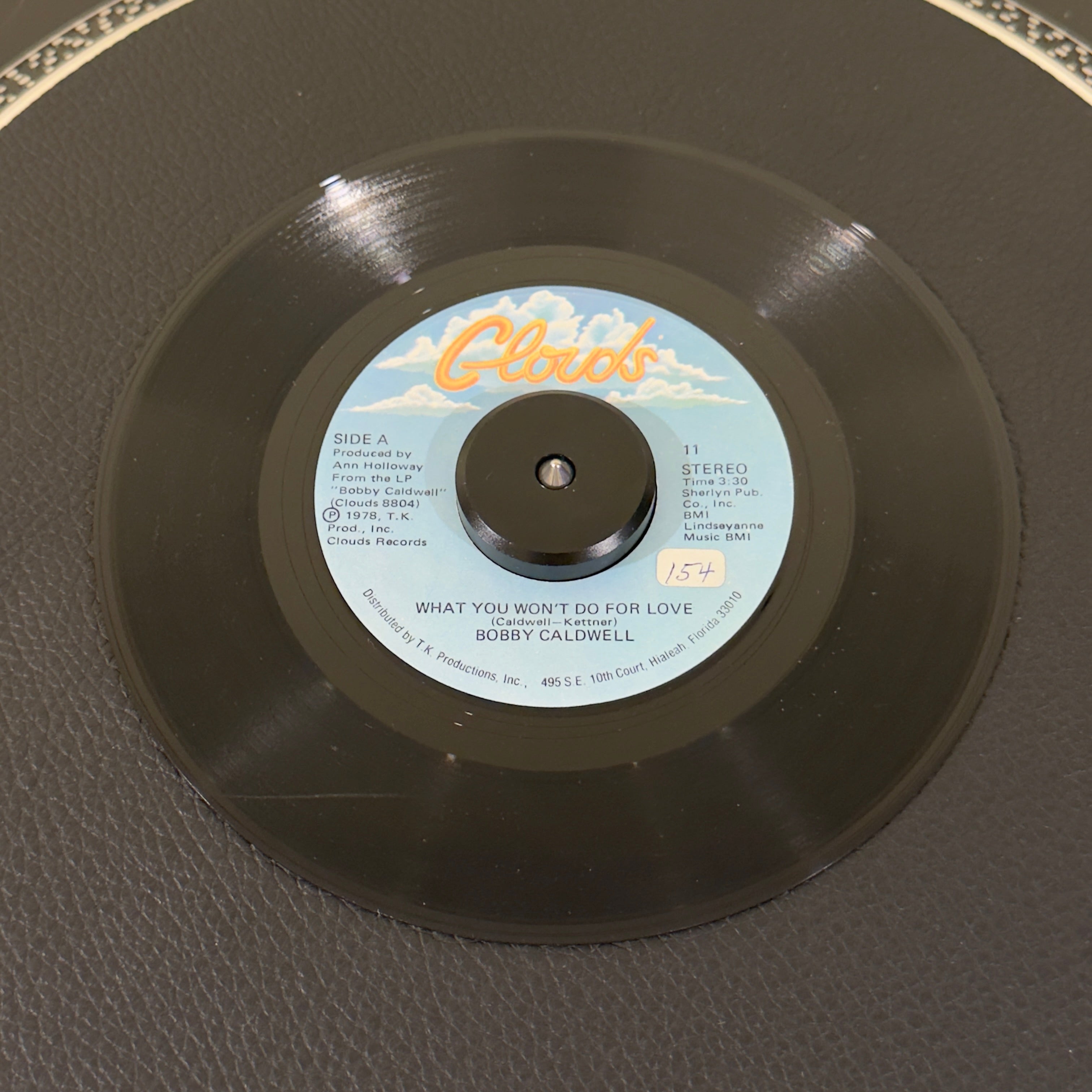 7" vinyl record by Caldwell, Bobby featuring "What You Won't Do For Love/Love Won't Wait", released on Disco (11), in VG (Very Good) condition, classic analog collectable for turntable playback. Undisputed banger sampled by various artists, inlcuding 2Pac & Aailiyah. Sticker on Side A.
