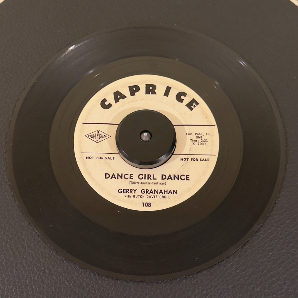 7" vinyl record by Granahan, Gerry featuring "Dance Girl Dance/Too Big For Her Bikini", released on Caprice (108), in VG (Very Good) condition, classic analog collectable for turntable playback. 1961 white-label promo pressing of an absolute stellar mid-tempo shaker.