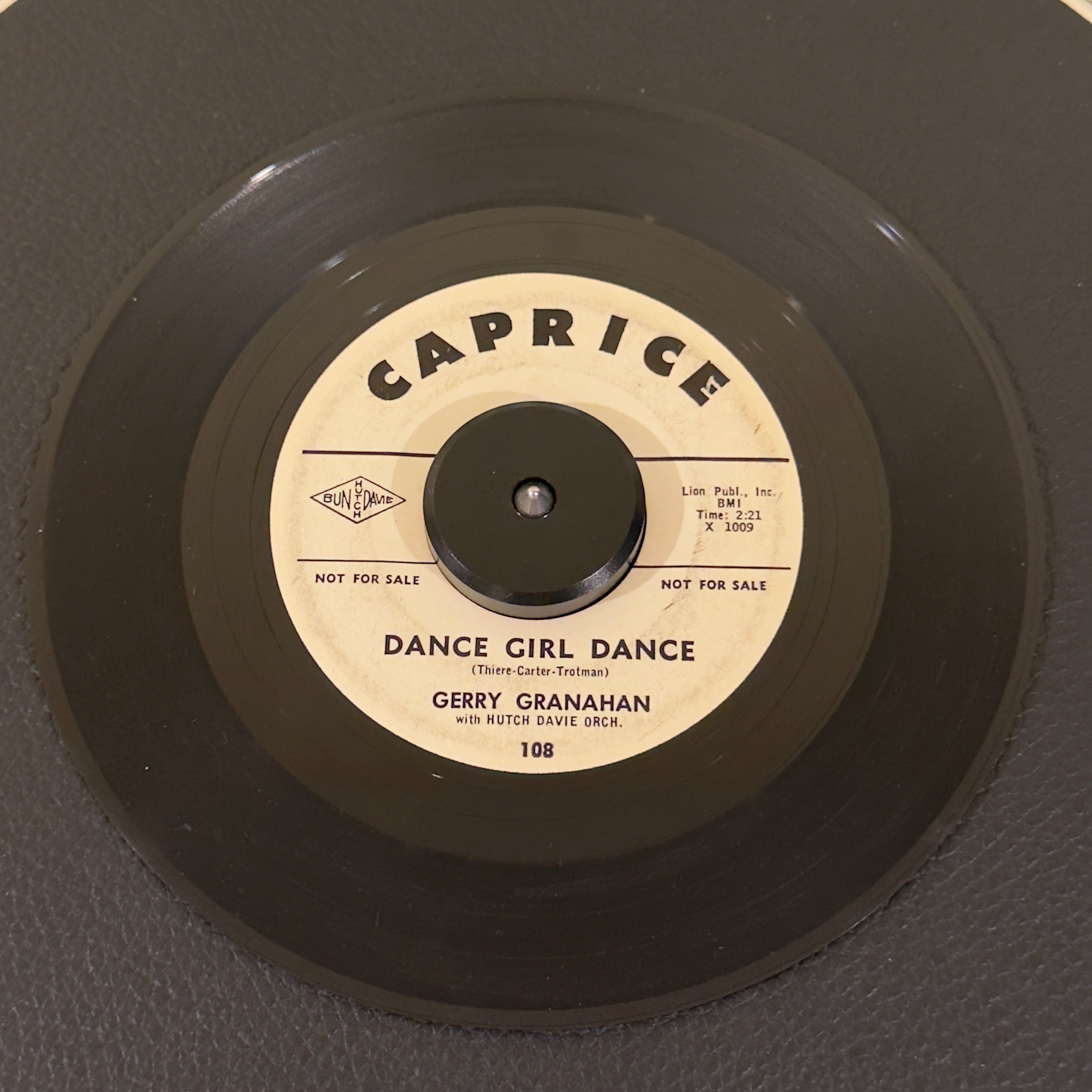 7" vinyl record by Granahan, Gerry featuring "Dance Girl Dance/Too Big For Her Bikini", released on Caprice (108), in VG (Very Good) condition, classic analog collectable for turntable playback. 1961 white-label promo pressing of an absolute stellar mid-tempo shaker.