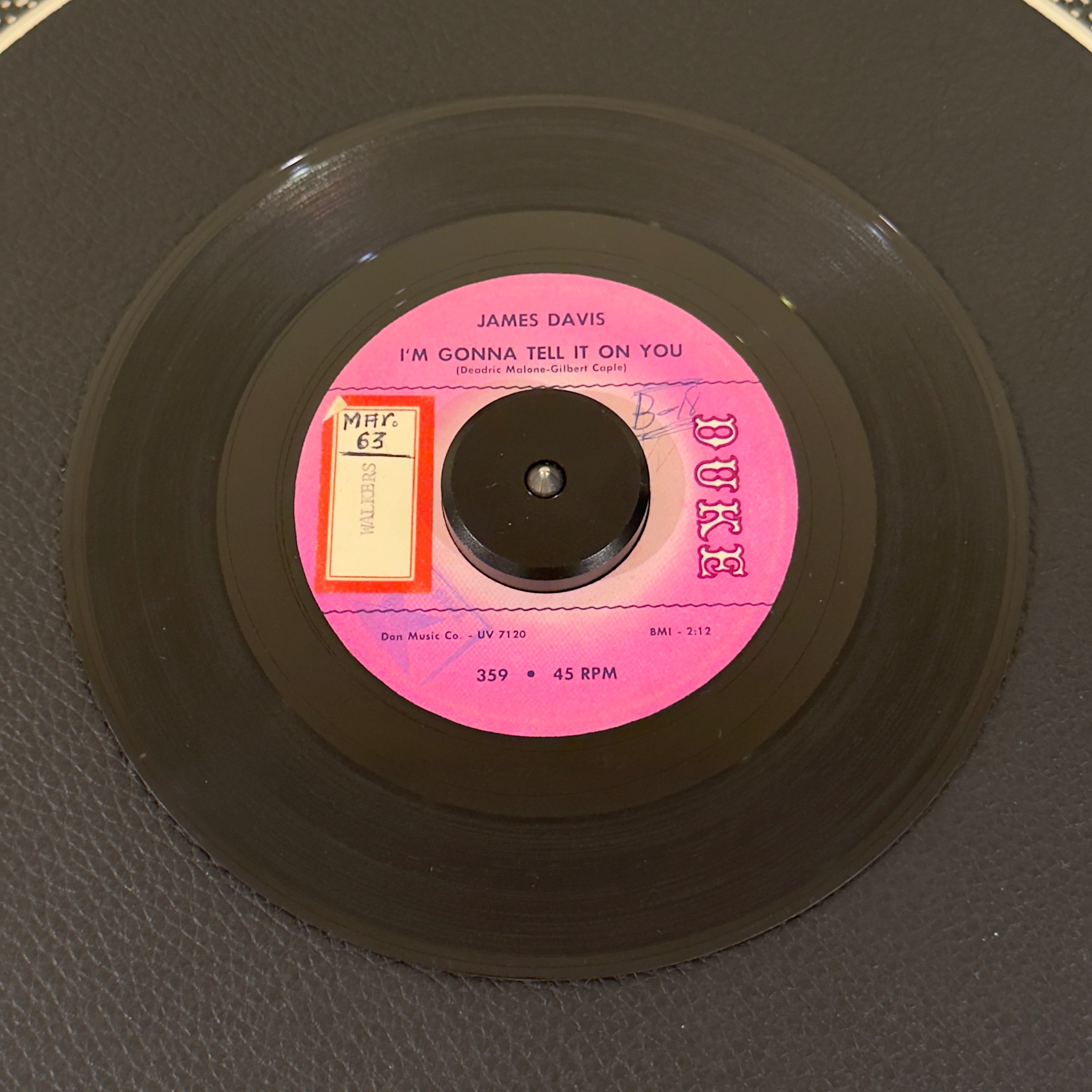 7" vinyl record by Davis, James featuring "I'm Gonna Tell It On You/My Precious Darling", released on Duke (359), in VG (Very Good) condition, classic analog collectable for turntable playback. Promo copy powerhouse, blending raw Texas blues shouting with a driving rhythm section.