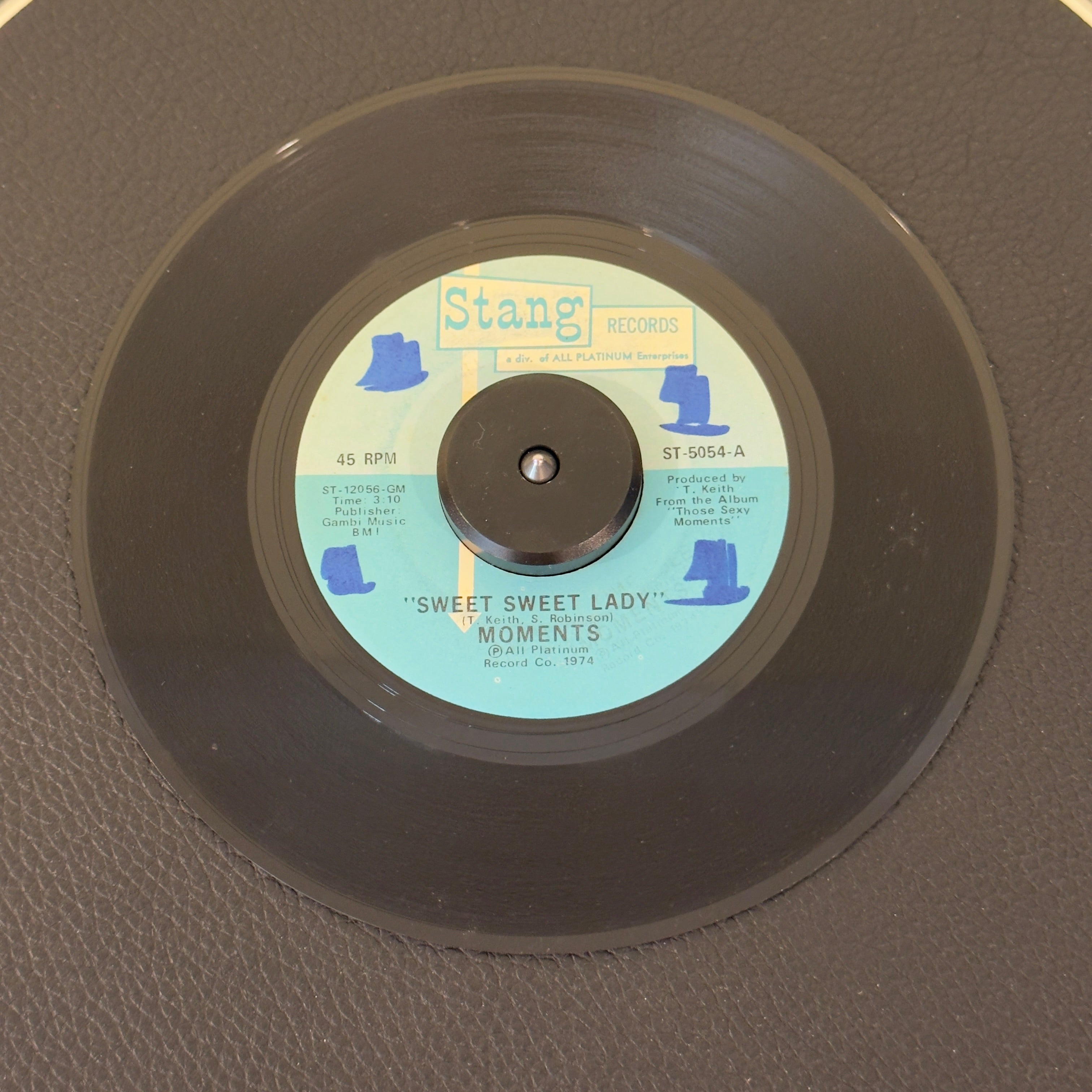 7" vinyl record by Moments featuring "Sweet Sweet Lady/The Next Time I See You", released on Stang Records (ST-5054), in VG+ (Very Good Plus) condition, classic analog collectable for turntable playback. 1974 pressing that delivers the smooth harmonies, sweeping arrangements, and emotional falsettos.  WOL on Side A.