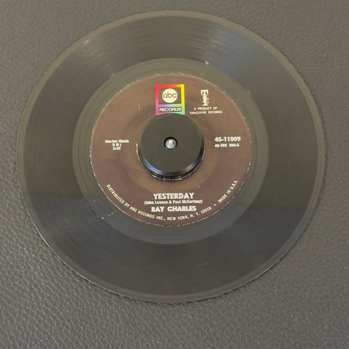 7" vinyl record by Charles, Ray featuring "Yesterday/Never Had Enough Of Nothing Yet", released on ABC Records (45-11009), in VG+ (Very Good Plus) condition, classic analog collectable for turntable playback. Ray Charles delivering his masterful, soulful rendition of The Beatles' classic "Yesterday". Original ABC sleeve.