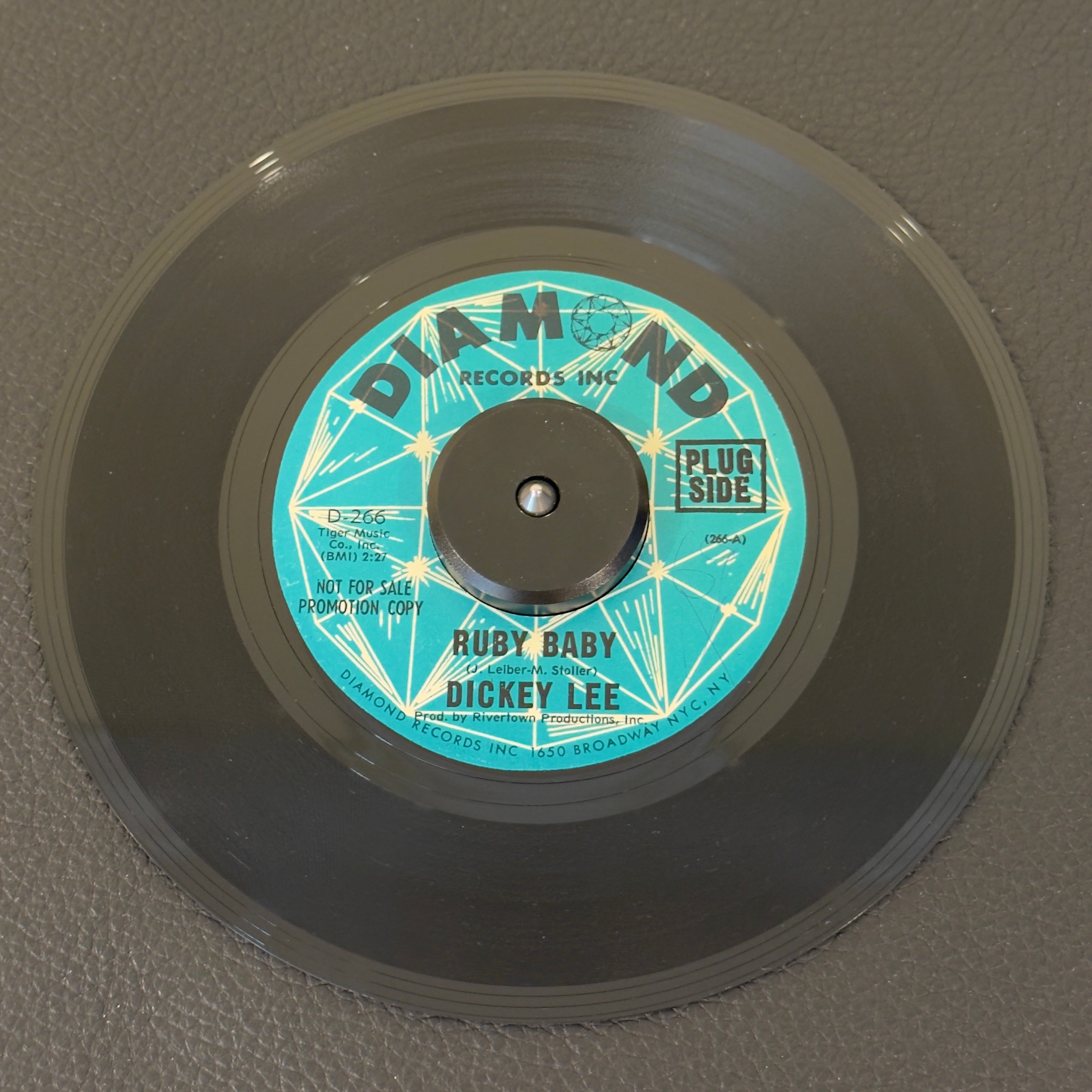 7" vinyl record by Lee, Dickey featuring "Ruby Baby/I Remember Barbara", released on Diamond Records (D-266), in VG+ (Very Good Plus) condition, classic analog collectable for turntable playback. Rare Diamond Records promo copy!