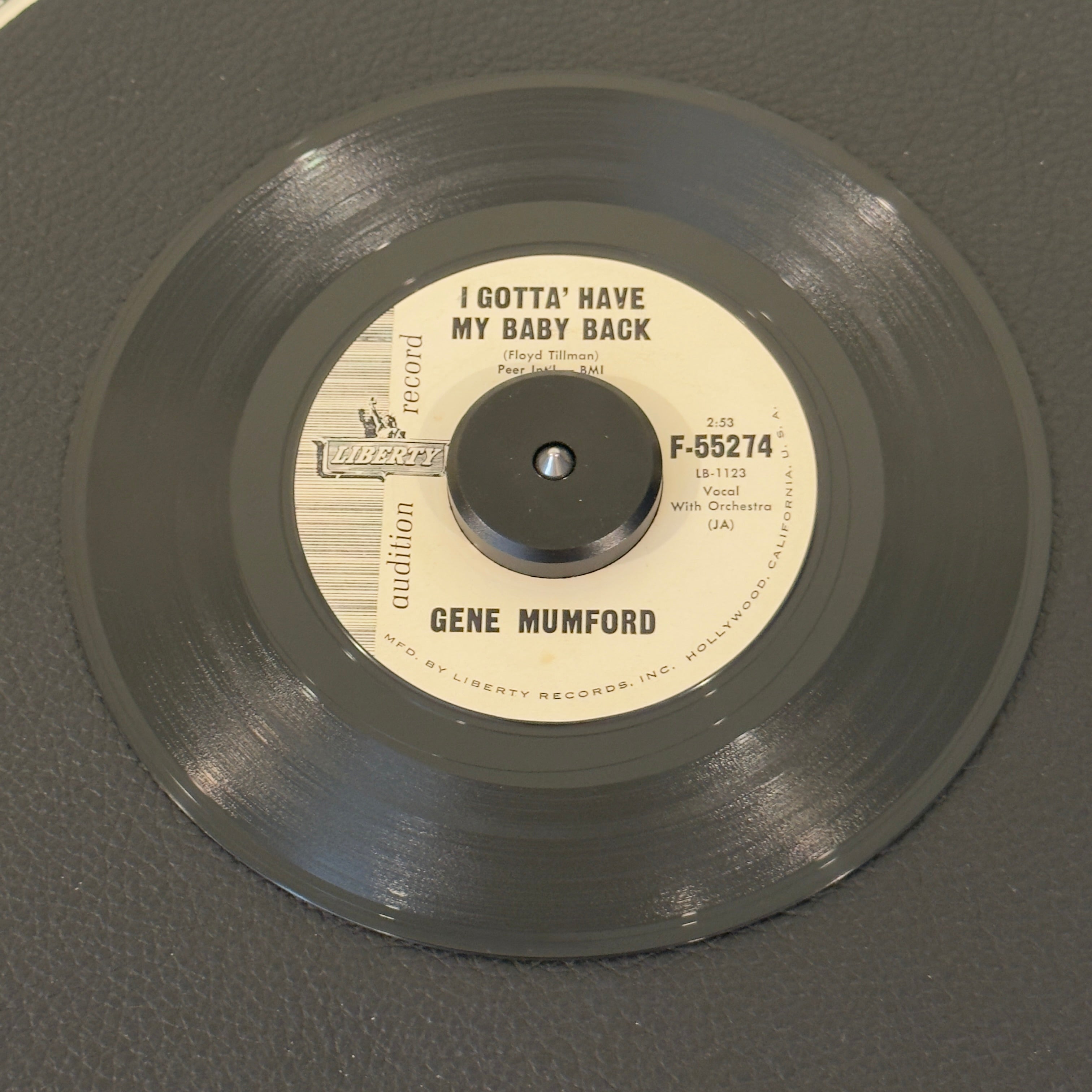 7" vinyl record by Mumford, Gene featuring "I Gotta' Have My Baby Back/Brazil", released on Liberty (F-55274), in VG (Very Good) condition, classic analog collectable for turntable playback. Best known as the soaring lead tenor for legendary vocal groups like The Larks, The Dominoes, and The Cadillacs, Gene Mumford steps into the spotlight alone on this stellar Liberty Records release.