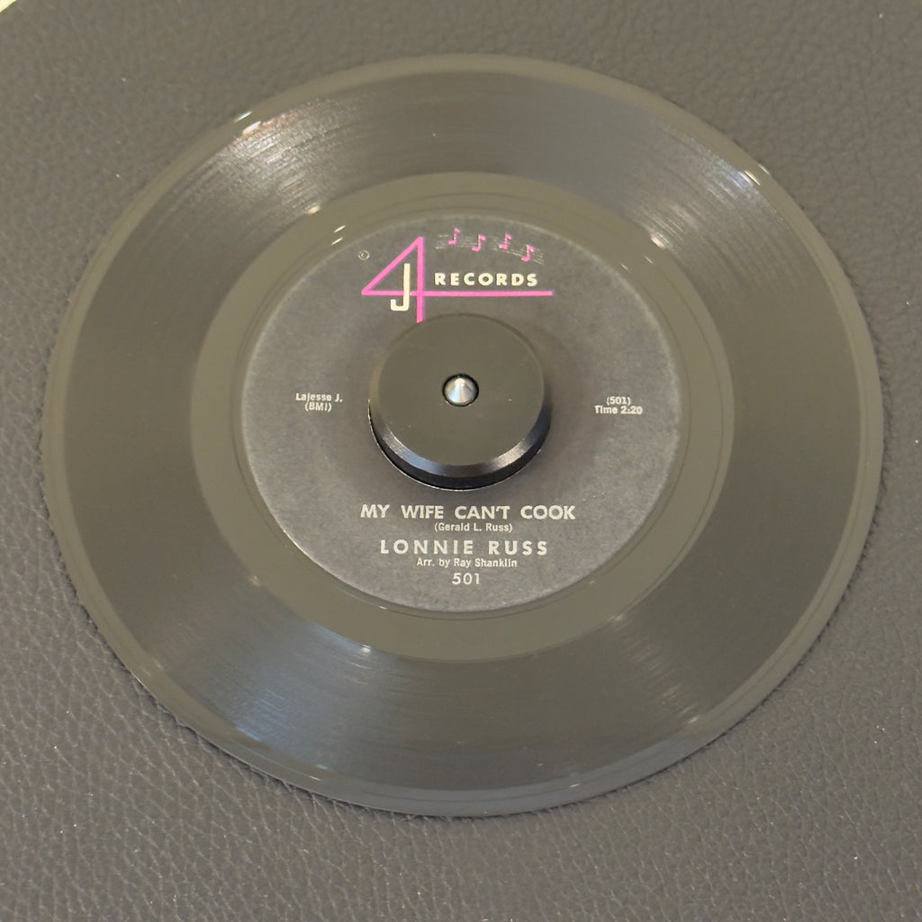 7" vinyl record by Russ, Lonnie featuring "My Wife Can't Cook/Something Old, Something New", released on 4 J Records (501), in VG+ (Very Good Plus) condition, classic analog collectable for turntable playback. Original 1962 copy of the rhythm & blues dance floor shaker.