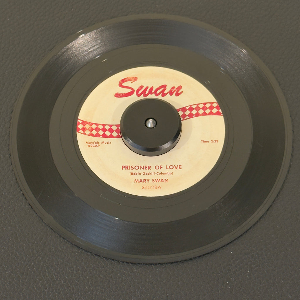 7" vinyl record by Swan, Mary featuring "Prisoner Of Love/My Girl Friend Betty", released on Swan (S4028), in VG (Very Good) condition, classic analog collectable for turntable playback. 1959 pop-R&B crossover milestone from Philadelphia's early rock scene.
