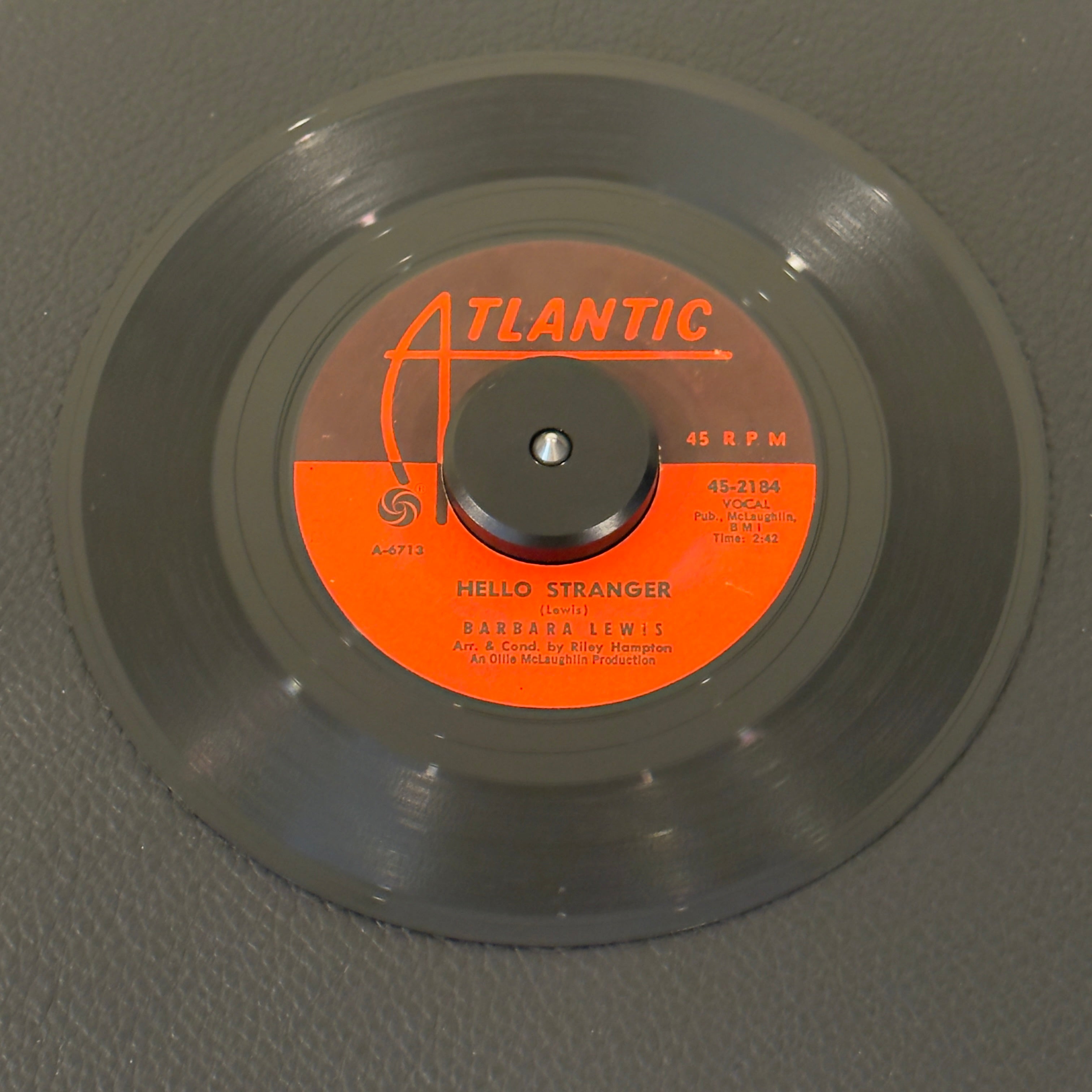7" vinyl record by Lewis, Barbara featuring "Hello Stranger/Think A Little Sugar", released on Atlantic (45-2184), in VG (Very Good) condition, classic analog collectable for turntable playback. 1963 landmark sweet soul classic featuring the smooth, unmistakable backing vocals of The Dells, "Hello Stranger" defines the early '60s Chicago soul sound. Original sleeve included.