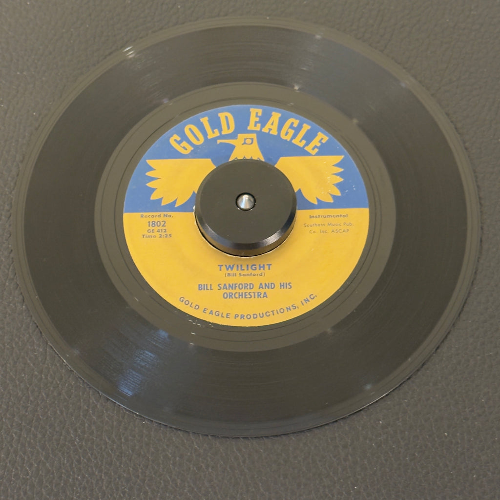 7" vinyl record by Sanford, Bill and His Orches featuring "Twilight/Drumboogie", released on Gold Eagle (1802), in VG (Very Good) condition, classic analog collectable for turntable playback. 1960s highly distinct, rock-slanted Mod Jazz and Space-Age piece.