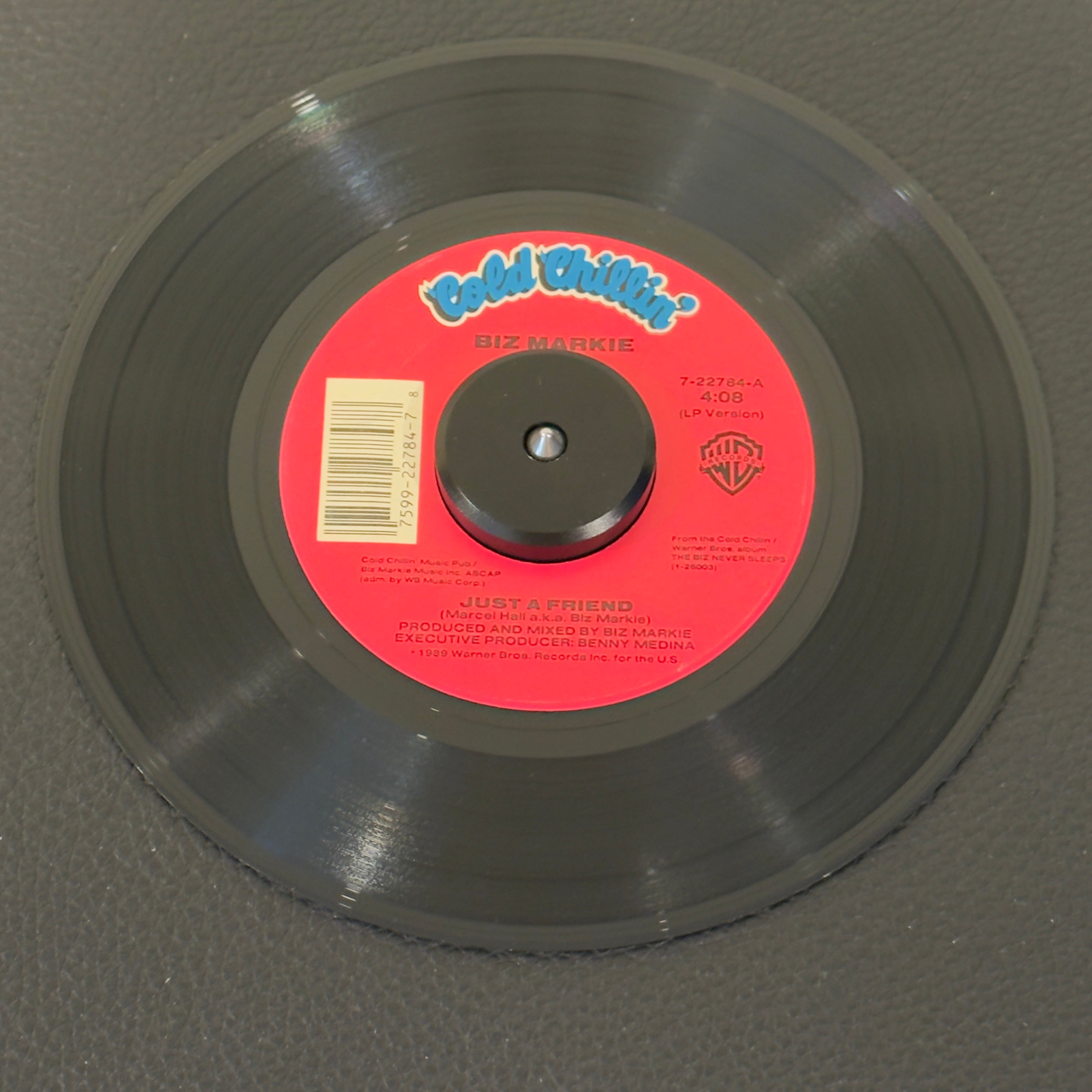 7" vinyl record by Biz Markie featuring "Just A Friend (LP Version)/(Instrumental)", released on Cold Chillin' (7-22784), in VG+ (Very Good Plus) condition, classic analog collectable for turntable playback. One of the most beloved and universally recognized tracks in hip-hop history.  Pic sleeve not included.