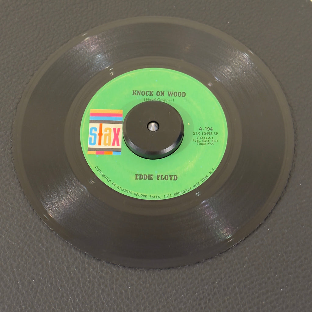 7" vinyl record by Floyd, Eddie featuring "Knock On Wood/Got To Make A Comeback", released on Stax (A-194), in VG (Very Good) condition, classic analog collectable for turntable playback. 1968 US reissue pressing of Eddie Floyd’s legendary anthem "Knock On Wood" is a classic slice of Memphis soul history!