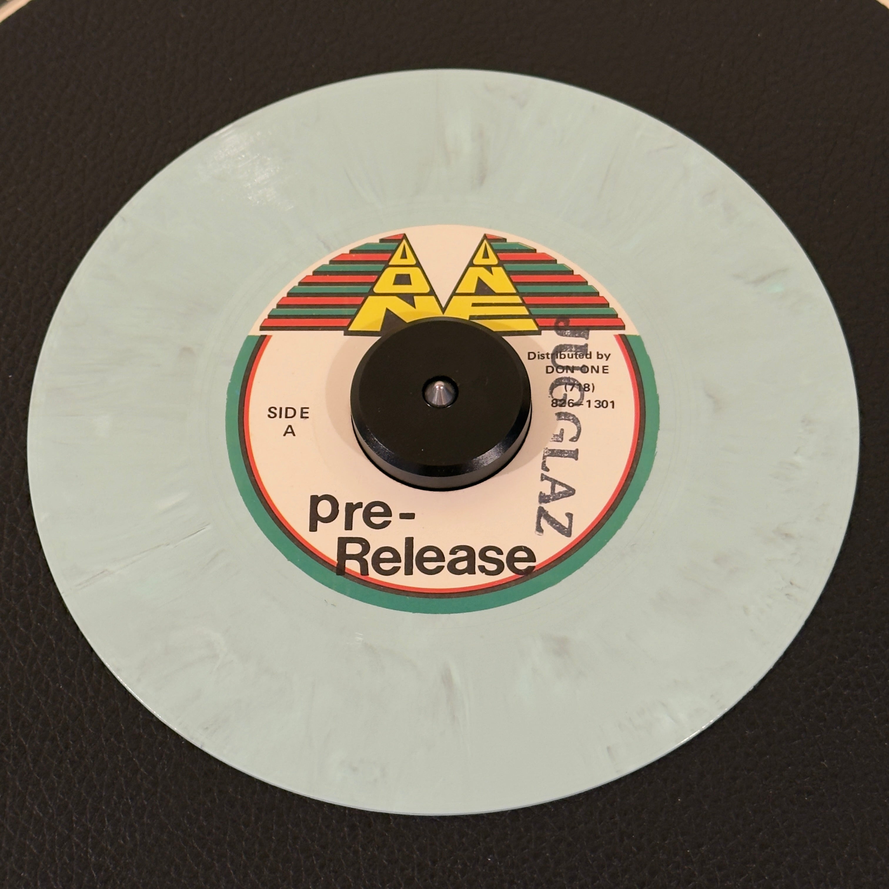 7" vinyl record by Sweetness, Ian featuring "Said And Done/Instrumental", released on Don One (), in VG+ (Very Good Plus) condition, classic analog collectable for turntable playback. Ultra-limited Pre-Release Pressing of a 1990s piece of Brooklyn reggae history, pressed on a beautiful, factory-customized marble splatter colored vinyl. DJ Stamp on Side A.