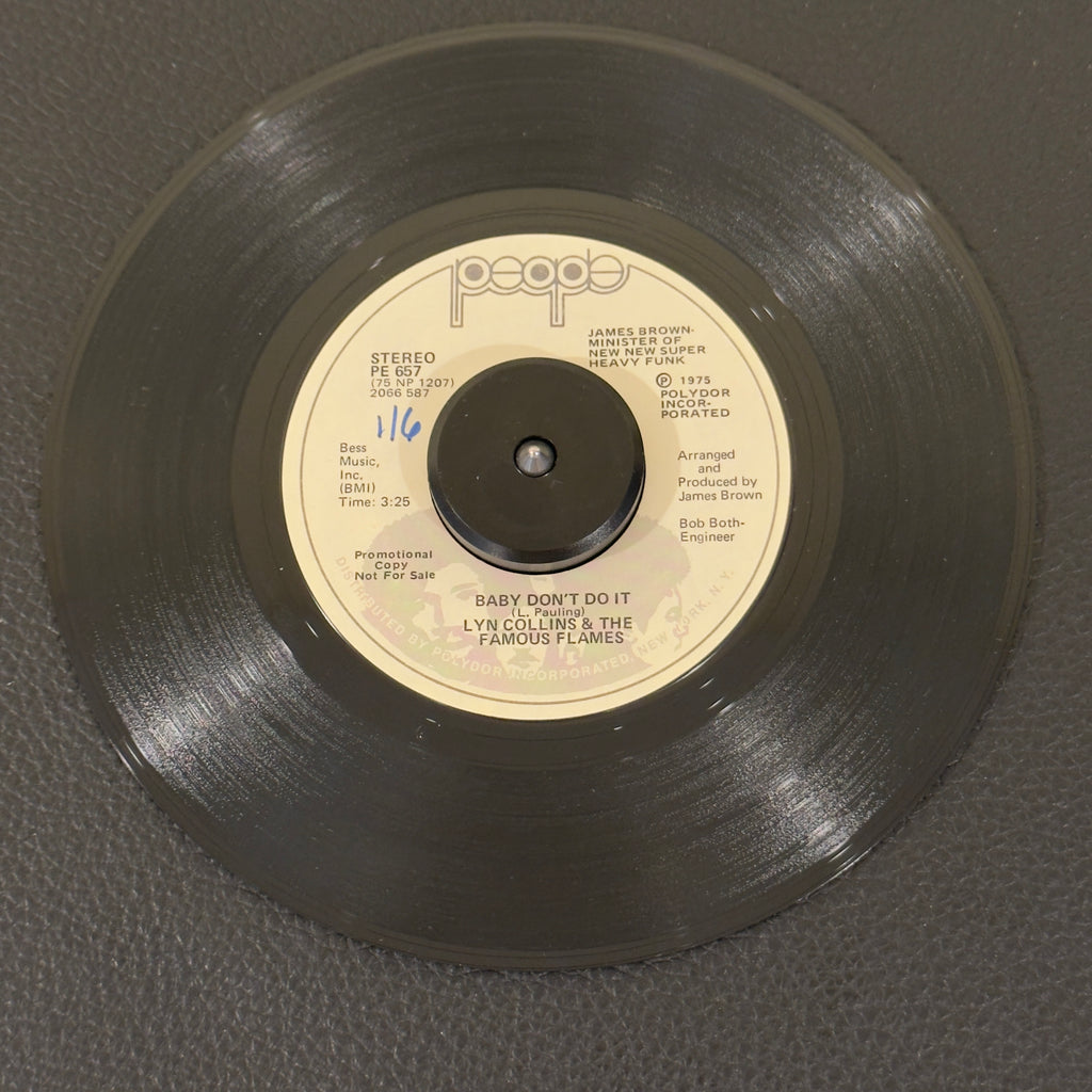 7" vinyl record by Collins, Lyn & The Famous Flames featuring "Baby Don't Do It/Baby Don't Do It", released on People (PE 657), in VG (Very Good) condition, classic analog collectable for turntable playback. This 1975 promo copy delivers a gritty vocal powerhouse performance layered over heavy horn stabs and a relentless syncopated rhythm block. WOL