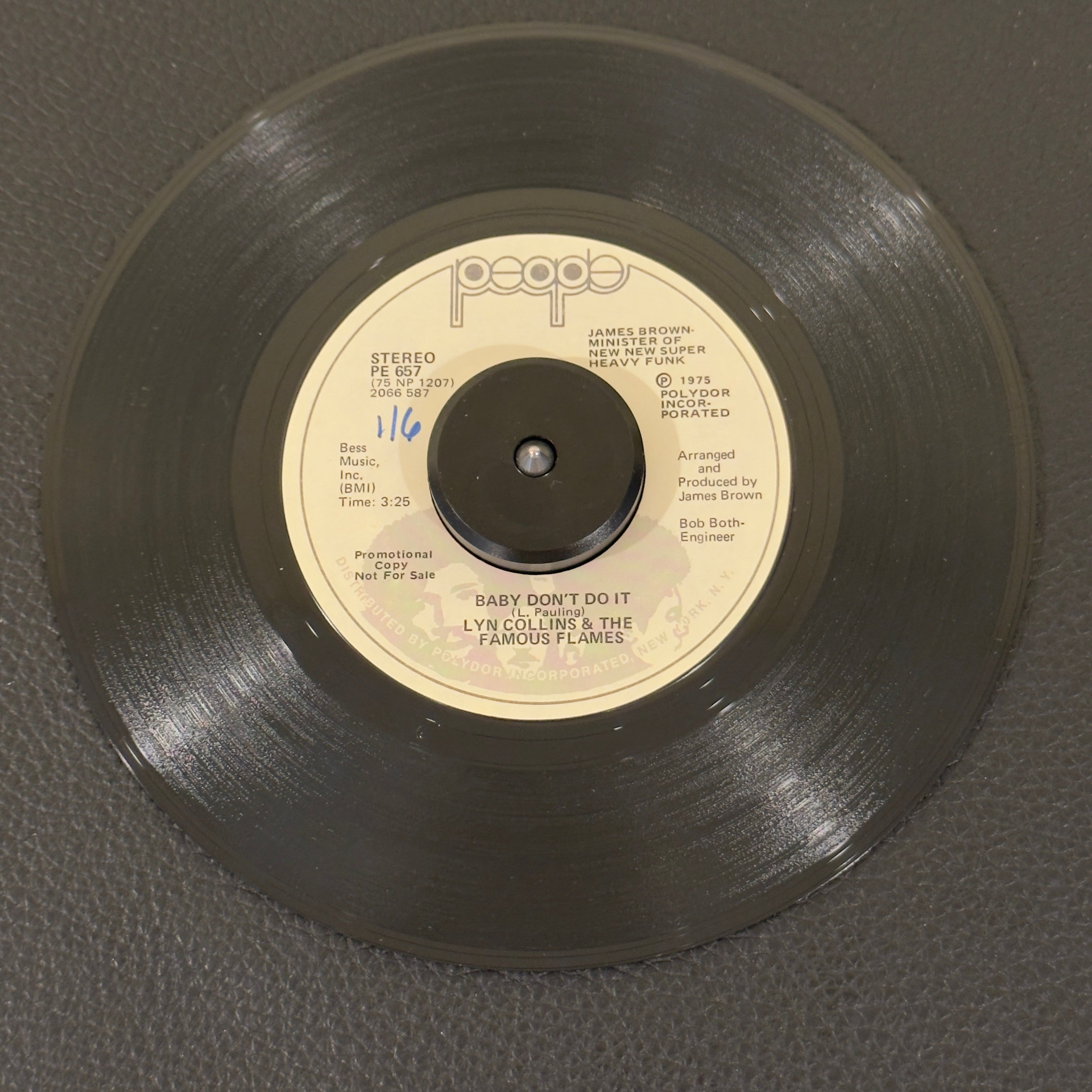 7" vinyl record by Collins, Lyn & The Famous Flames featuring "Baby Don't Do It/Baby Don't Do It", released on People (PE 657), in VG (Very Good) condition, classic analog collectable for turntable playback. This 1975 promo copy delivers a gritty vocal powerhouse performance layered over heavy horn stabs and a relentless syncopated rhythm block. WOL