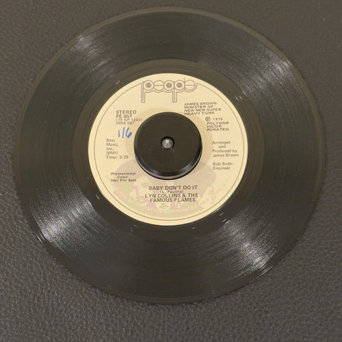 7" vinyl record by Collins, Lyn & The Famous Flames featuring "Baby Don't Do It/Baby Don't Do It", released on People (PE 657), in VG (Very Good) condition, classic analog collectable for turntable playback. This 1975 promo copy delivers a gritty vocal powerhouse performance layered over heavy horn stabs and a relentless syncopated rhythm block. WOL