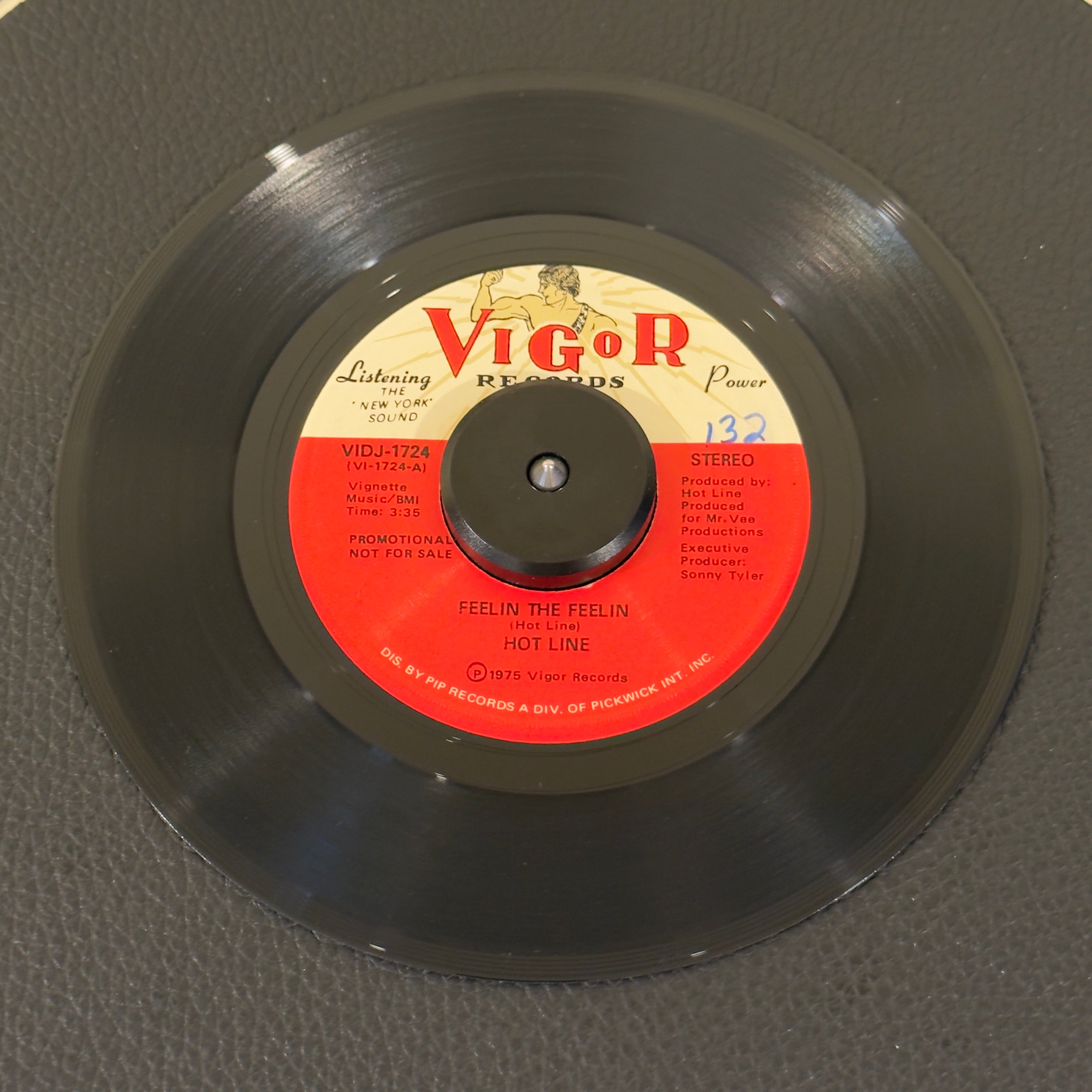 7" vinyl record by Hot Line featuring "Feelin The Feelin (Stereo)/(Mono)", released on Vigor Records (VIDJ-1724), in VG+ (Very Good Plus) condition, classic analog collectable for turntable playback. Promotional Copy of infectious, overlooked 1975 dancefloor groover!! WOL.