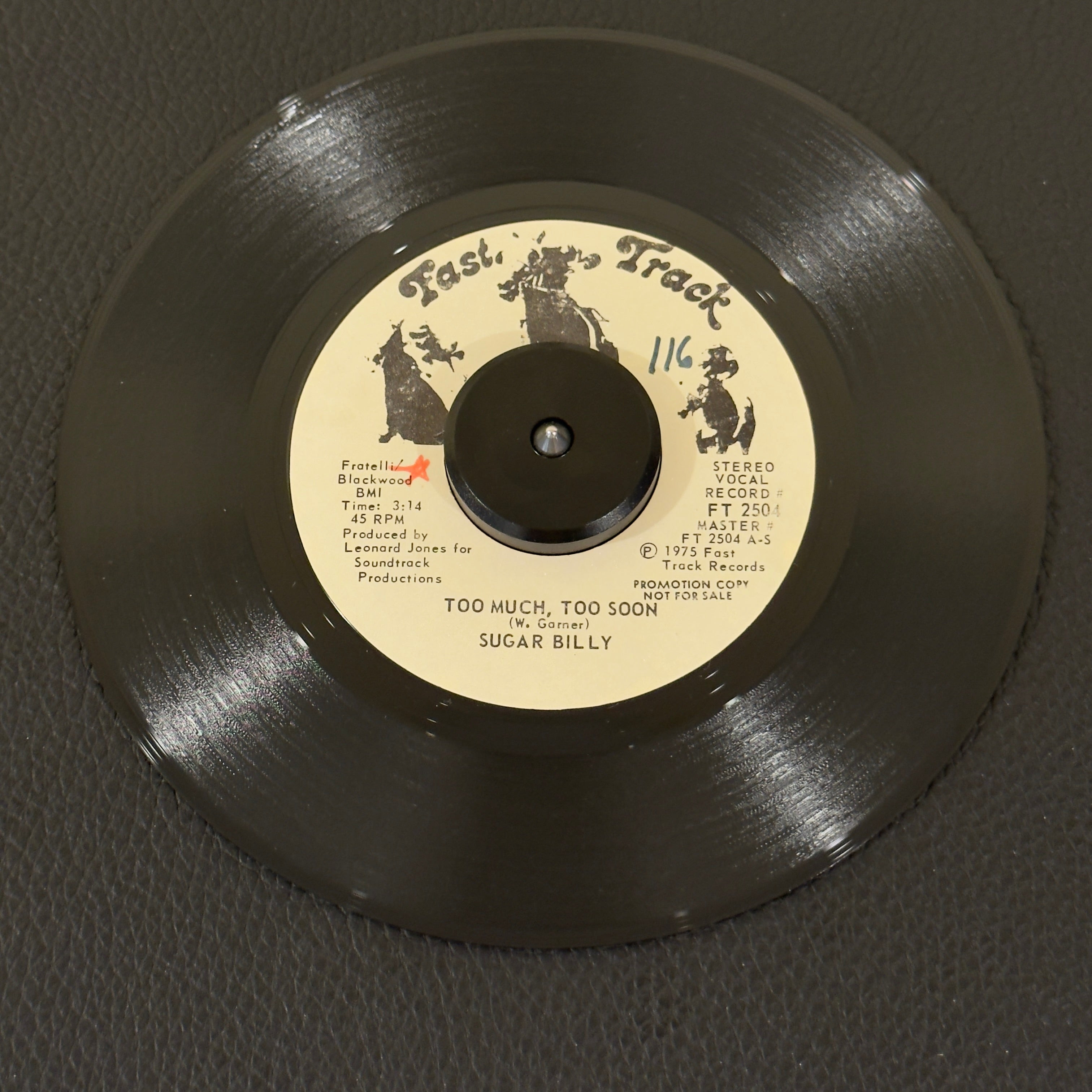 7" vinyl record by Sugar Billy featuring "Too Much, Too Soon/Love Bug", released on Fast Track (FT 2504), in NM (Near Mint) condition, classic analog collectable for turntable playback. 1975 Promotional copy of a masterclass in gritty soul, perfectly blended with slick, sophisticated vocal arrangements and a hard-hitting, dancefloor-friendly groove.  WOL