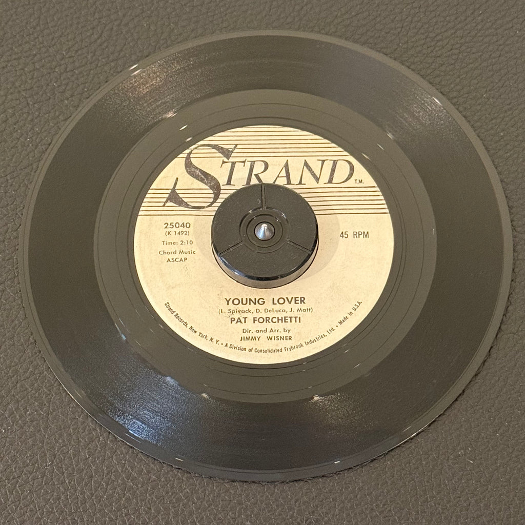 7" vinyl record by Forchetti, Pat featuring "Young Lover/Our Kind Of Love", released on Strand (25040), in VG+ (Very Good Plus) condition, classic analog collectable for turntable playback. 