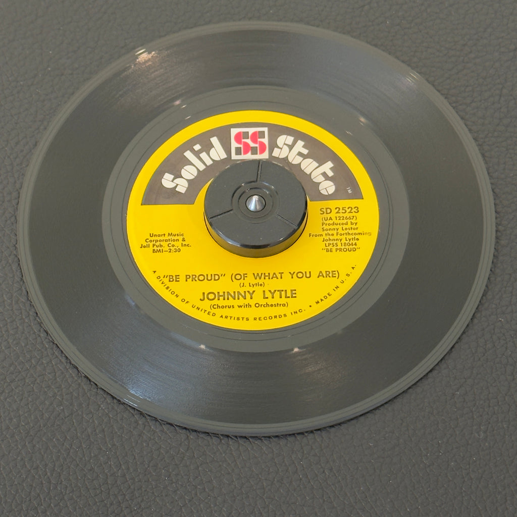7" vinyl record by Lytle, Johnny featuring "Be Proud (Of What You Are)/You've Got To Love The World", released on Solid State Records (SD 2523), in NM (Near Mint) condition, classic analog collectable for turntable playback. 