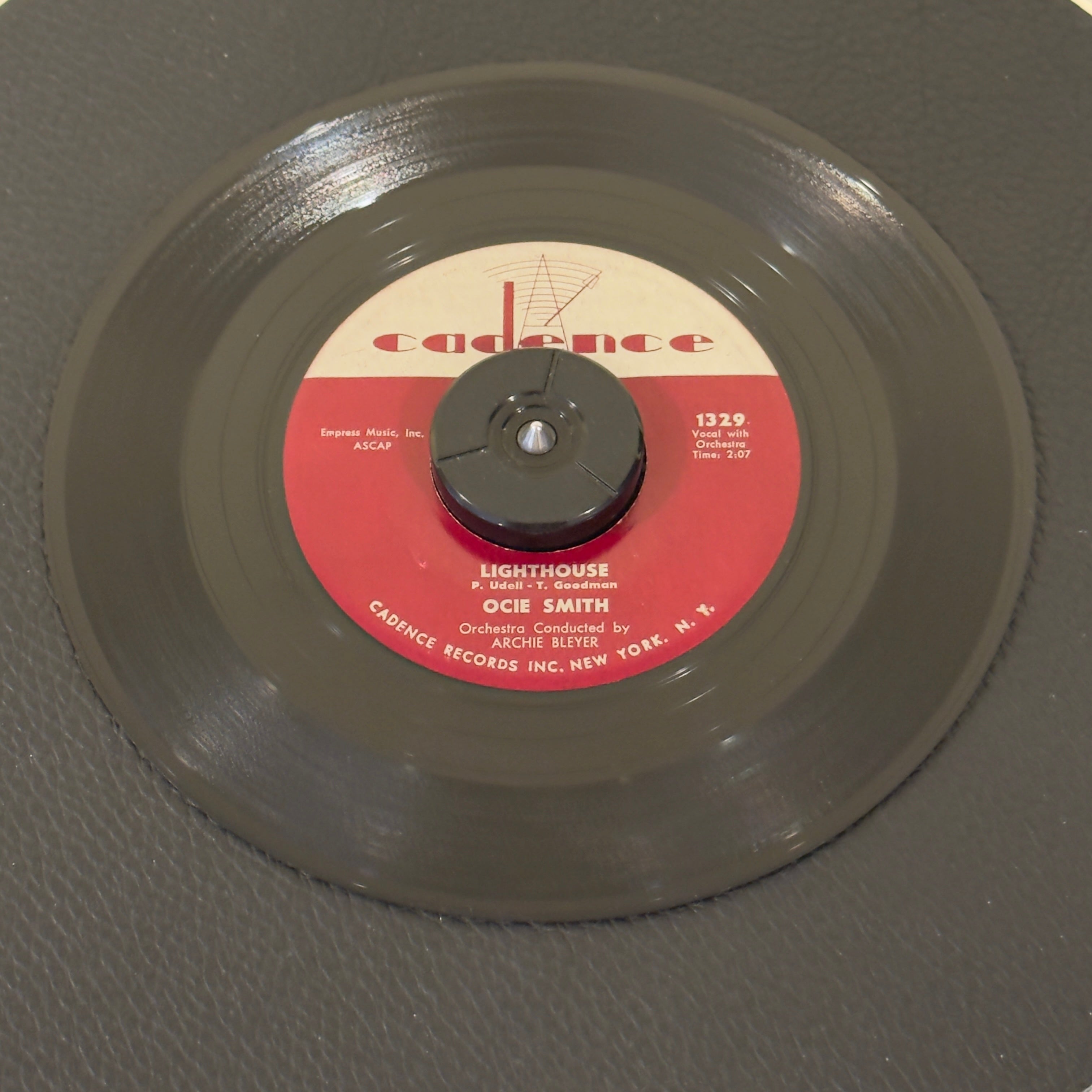 7" vinyl record by Smith, Ocie featuring "Lighthouse/Too Many", released on Cadence (1329), in VG+ (Very Good Plus) condition, classic analog collectable for turntable playback. Title Variation (Side A - Lighthouse)