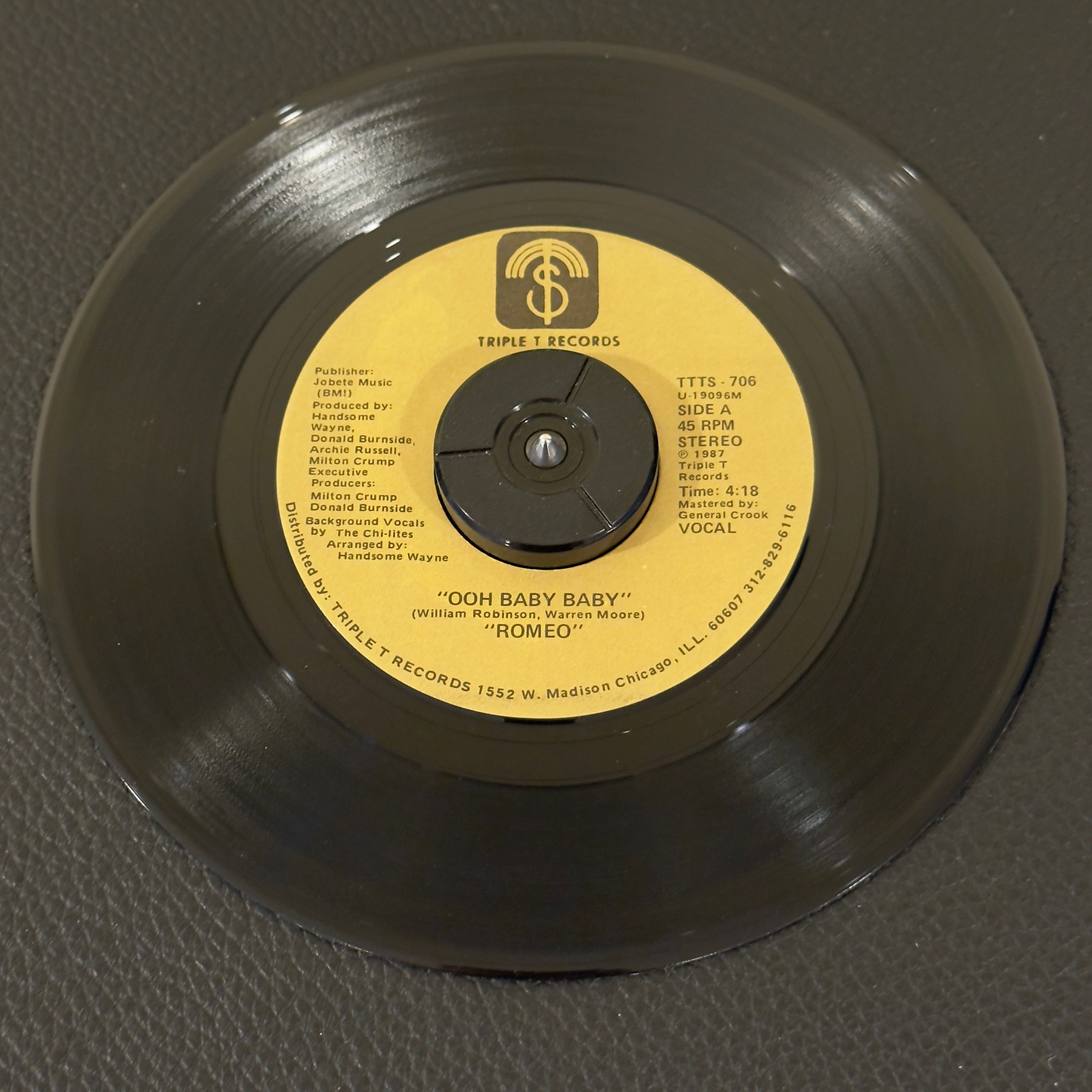 7" vinyl record by Romeo featuring "Ooh Baby Baby/Ooh Baby Baby", released on Triple T Records (TTTS-706), in NM (Near Mint) condition, classic analog collectable for turntable playback. 