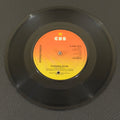 7" vinyl record by Judas Priest featuring "Evening Star/Beyond The Realms of Death", released on CBS (S CBS 7312), in VG (Very Good) condition, classic analog collectable for turntable playback. UK Pressing. Punch hole in label.