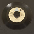 7" vinyl record by Harlem River Drive featuring "Need You/Overtime", released on Arista (AS-0142), in NM (Near Mint) condition, classic analog collectable for turntable playback. NAMI Pressing.  Includes original Arista sleeve.  Writing on Side A of label.