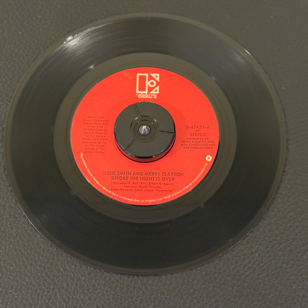 7" vinyl record by Smith, Leslie featuring "Before The Night Is Over/Don't Shut The Door (On My Love)", released on Elektra (E-47451), in VG+ (Very Good Plus) condition, classic analog collectable for turntable playback. Includes original Elektra sleeve.