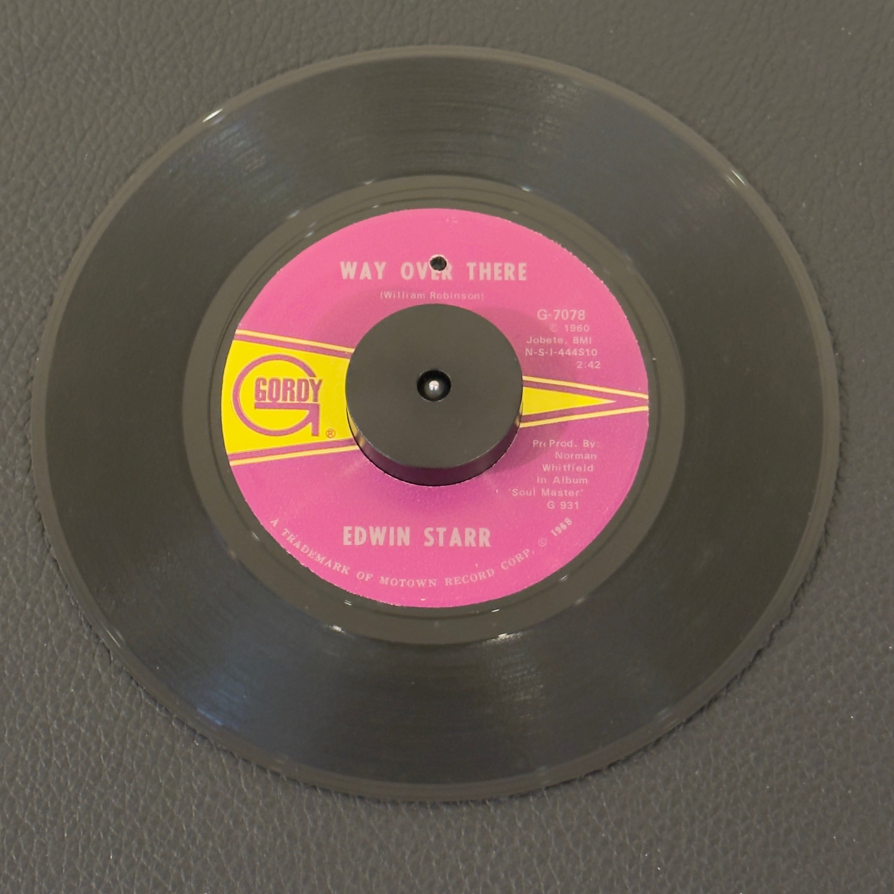 7" vinyl record by Starr, Edwin featuring "Way Over There/If My Heart Could Tell The Story", released on Gordy (G-7078), in VG+ (Very Good Plus) condition, classic analog collectable for turntable playback. ARP Pressing.  Punch hole in label.