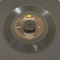 7" vinyl record by Panchito featuring "Descuido/Imploracion", released on Ansonia Records, Inc (45-6203), in VG (Very Good) condition, classic analog collectable for turntable playback. Includes Ansonia sleeve.