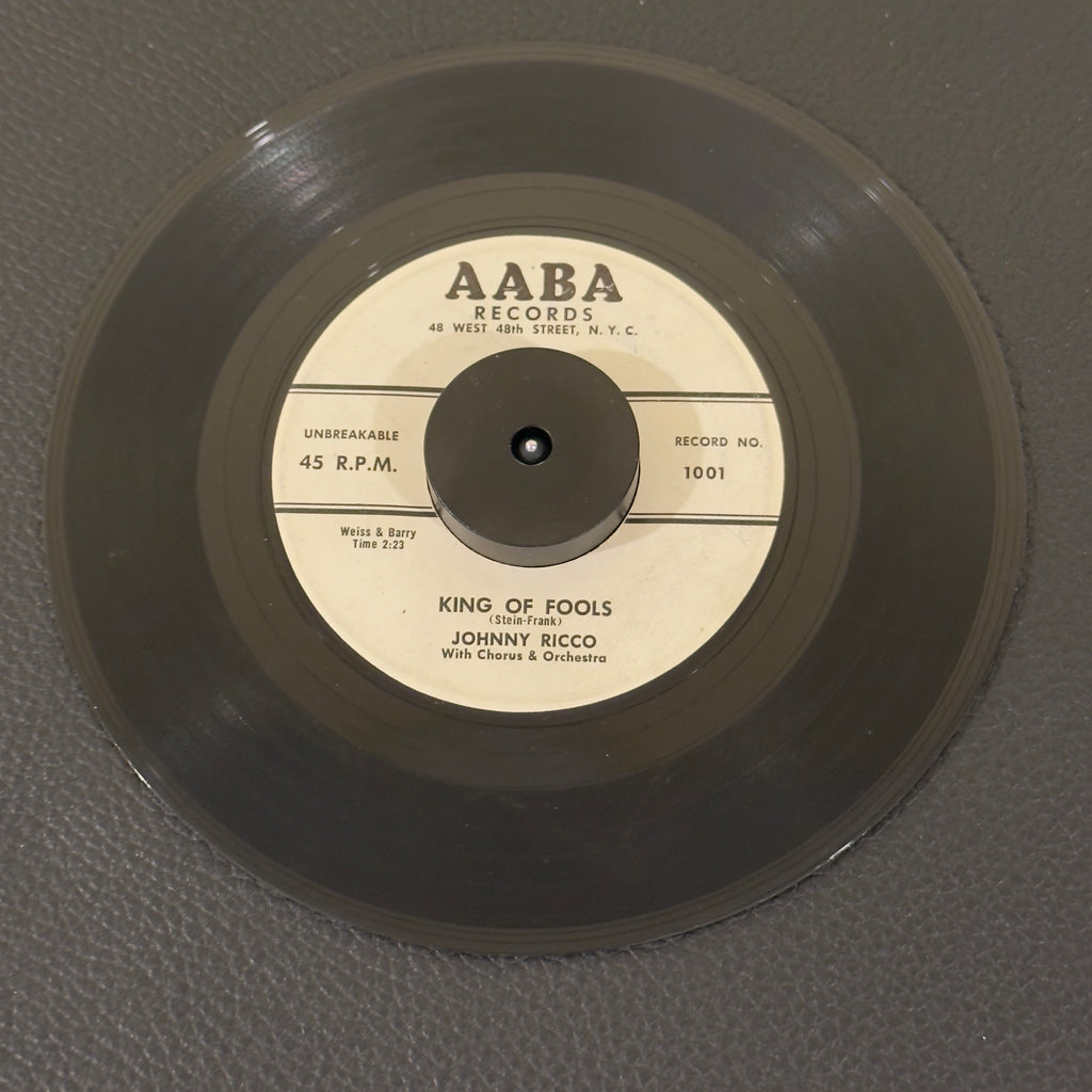7" vinyl record by Ricco, Johhny featuring "King Of Fools/I'll Never Smile Again", released on AABA Records (1001 / 1002), in VG (Very Good) condition, classic analog collectable for turntable playback. 