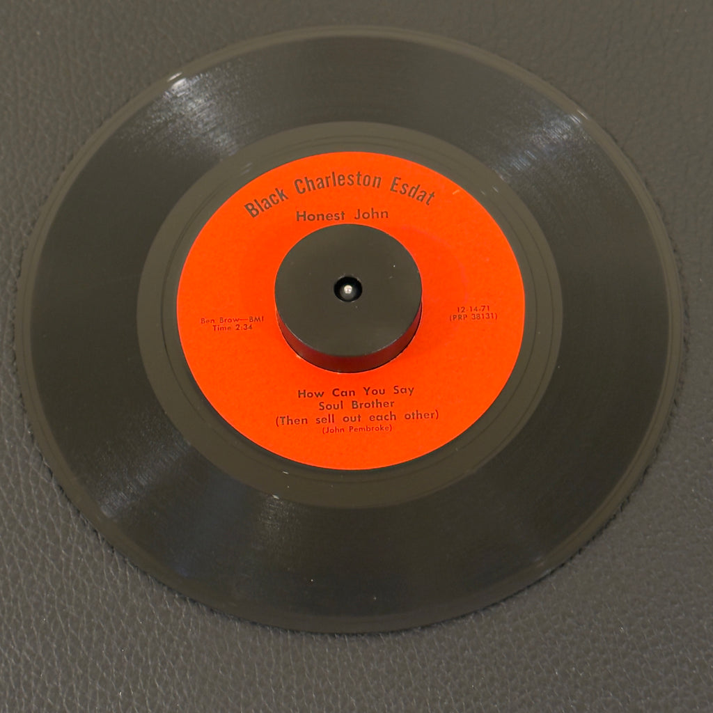 7" vinyl record by Honest John featuring "How Can You Say Soul Brother/How Can You Say Soul Brother", released on Black Charleston Esdat (26281), in VG (Very Good) condition, classic analog collectable for turntable playback. 