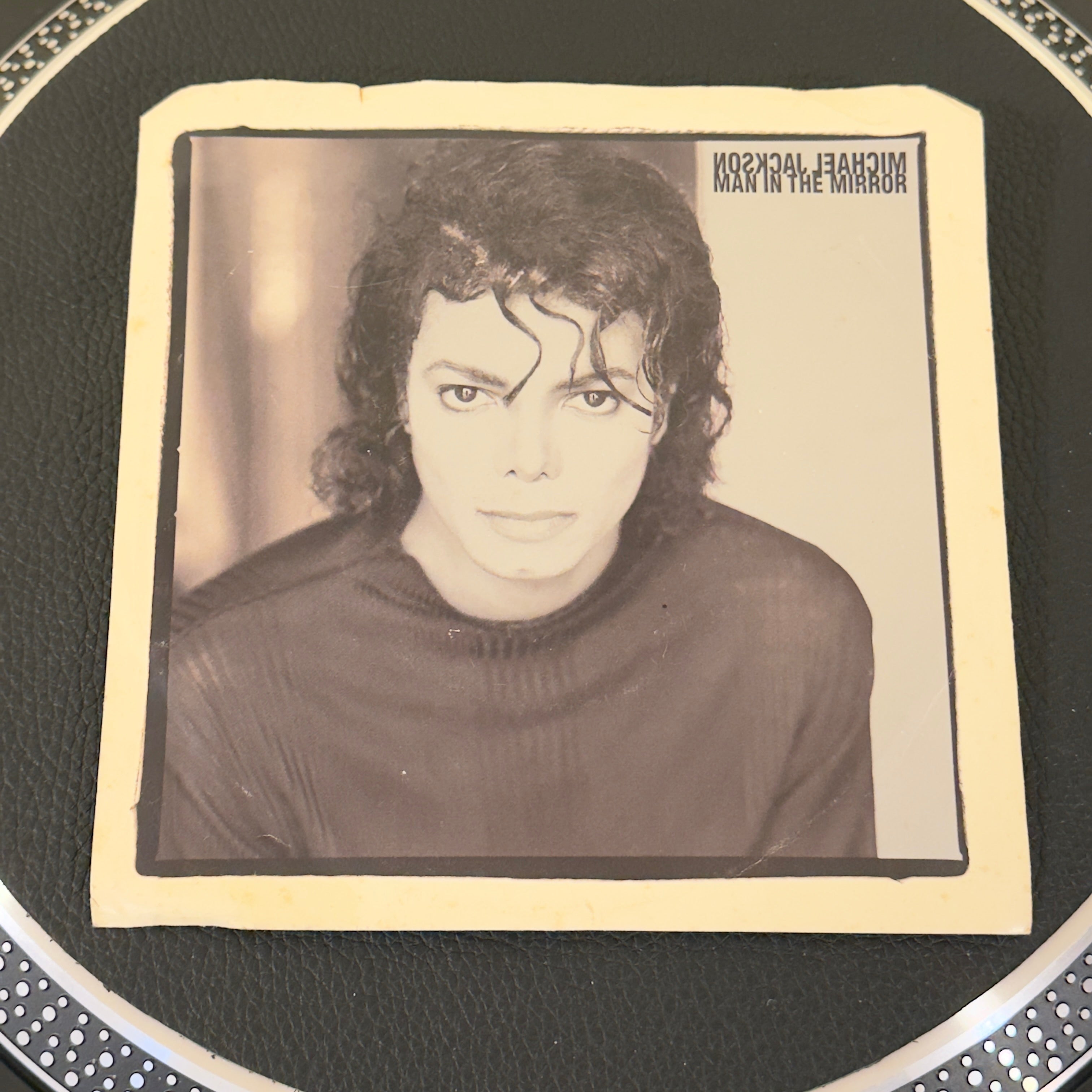 7" vinyl record by Jackson, Michael featuring "Man In The Mirror/Man In The Mirror", released on Epic (34-07668), in VG+ (Very Good Plus) condition, classic analog collectable for turntable playback. Pic Sleeve - Promo Copy.