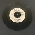 7" vinyl record by Martin, Bet E. featuring "One-Woman Man/Maybe You'll Be There", released on Epic (2714970), in VG (Very Good) condition, classic analog collectable for turntable playback. Vintage 1959 Rock Promo in generic white sleeve.