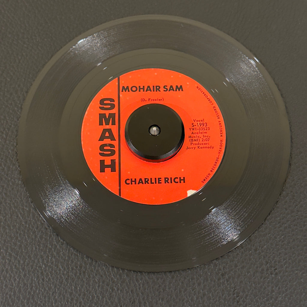 7" vinyl record by Rich, Charlie featuring "Mohair Sam/I Washed My Hands In Muddy Water", released on Smash Records (S-1993), in VG (Very Good) condition, classic analog collectable for turntable playback. The "Silver Fox" performing his smash hit!  Includes original Smash Records sleeve.