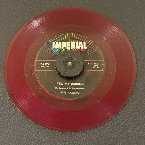7" vinyl record by Fats Domino featuring "Yes, My Darling/Don't You Know I Love You", released on Imperial (X5492), in VG (Very Good) condition, classic analog collectable for turntable playback. Red Vinyl.
