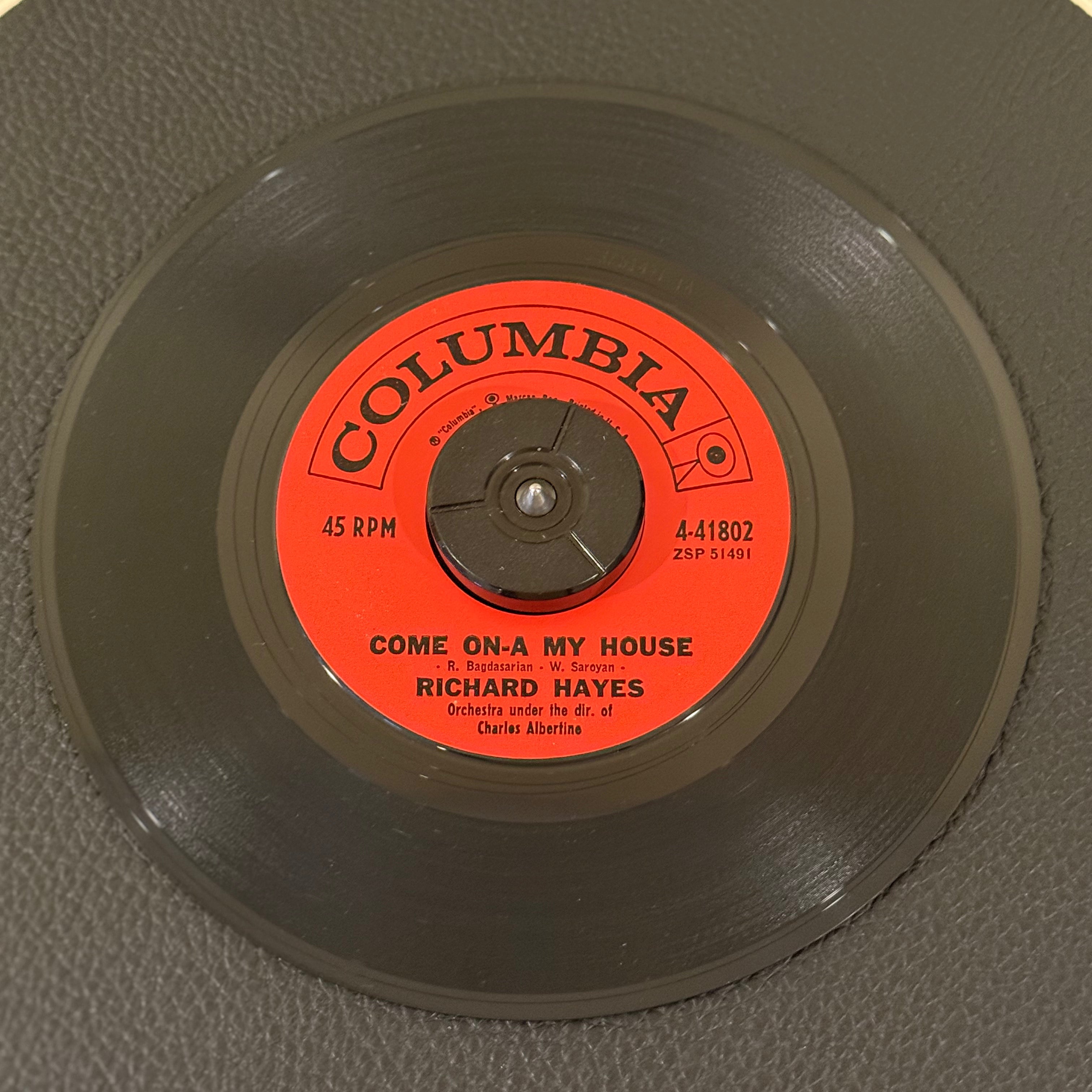 7" vinyl record by Hayes, Richard featuring "Come-On-A My House/Italian Style", released on Columbia (4-41802), in VG (Very Good) condition, classic analog collectable for turntable playback. Includes Columbia sleeve.