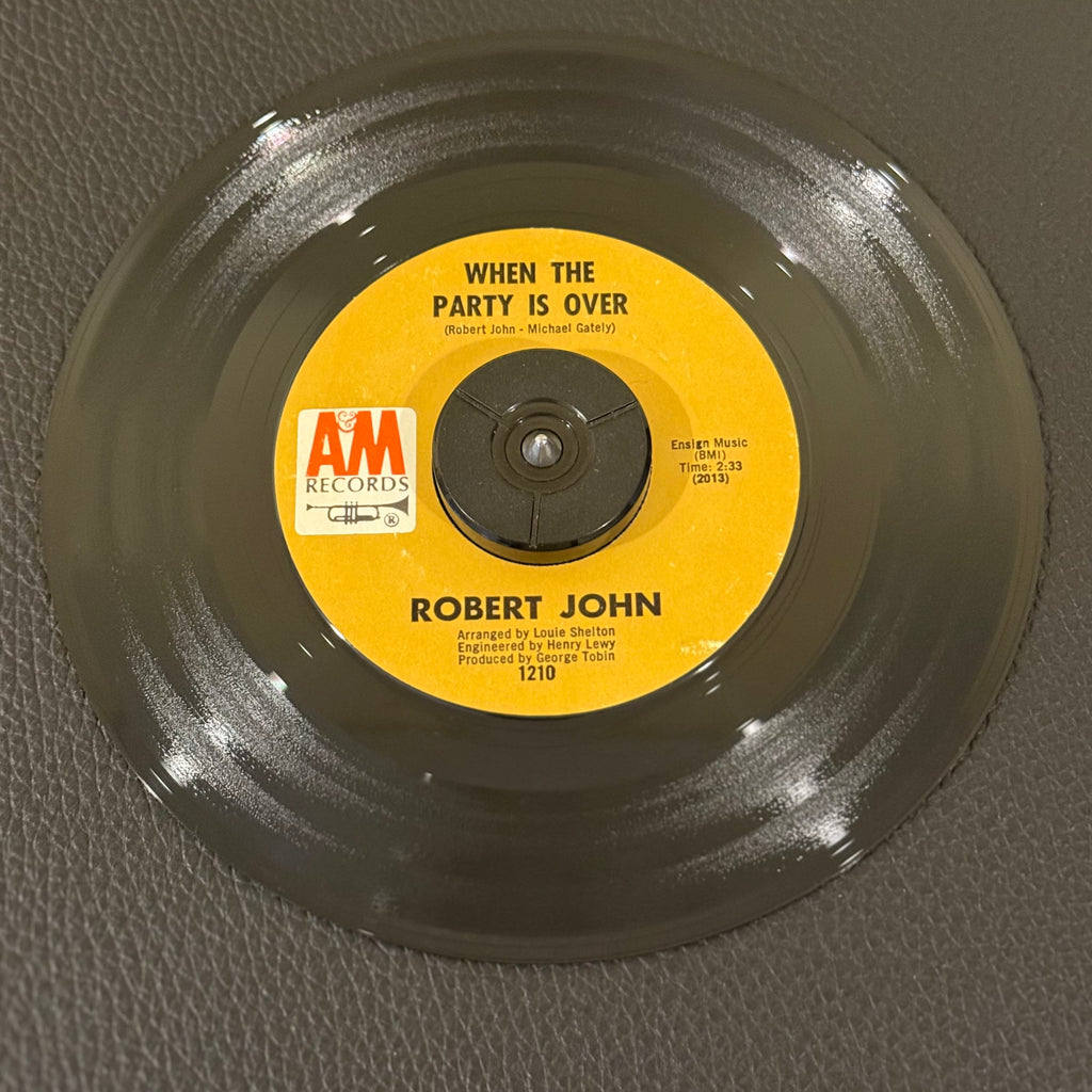 7" vinyl record by John, Robert featuring "When The Party Is Over/Raindrops, Love and Sunshine", released on A&M Records (1210), in VG+ (Very Good Plus) condition, classic analog collectable for turntable playback. Monarch Pressing.